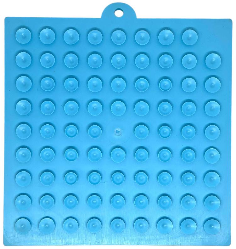 Suction cup holder used to help keep a lick mat in place during feeding