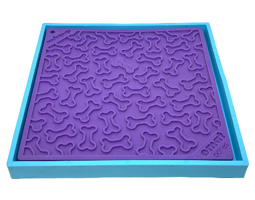 Suction cup holder for stabilising dog bowls on tile and other smooth surfaces