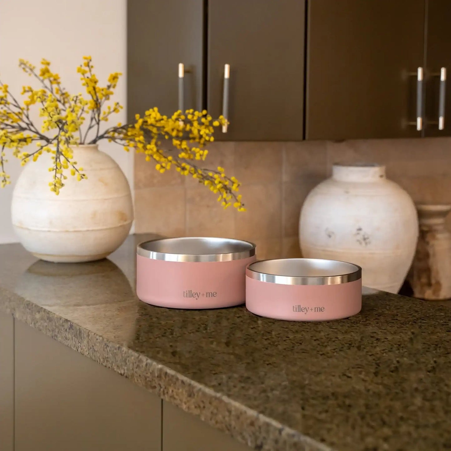 Pink stainless steel pet bowl with a non-slip base