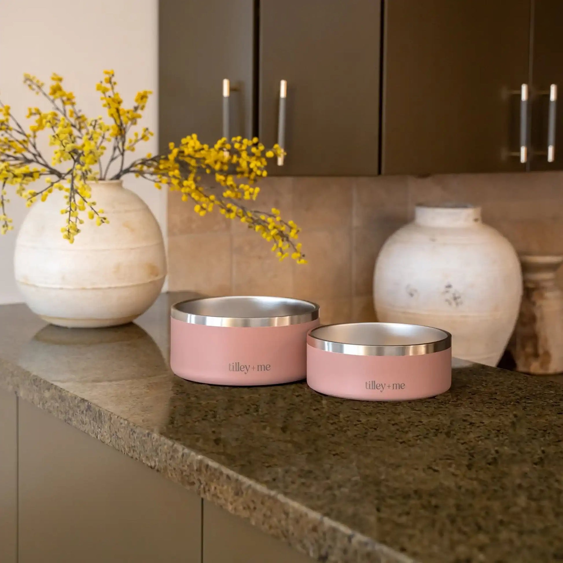 Pink stainless steel pet bowl with a non-slip base