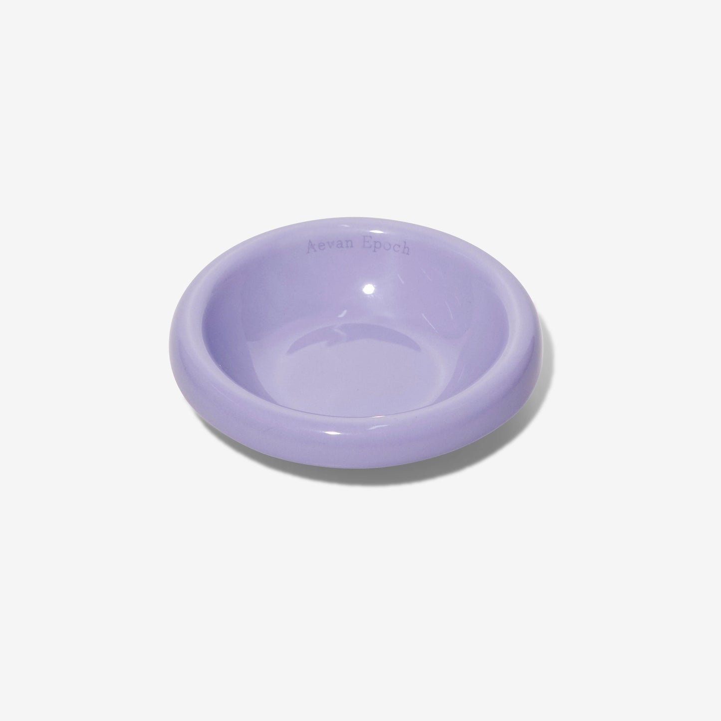 Purple pet bowl on a white background