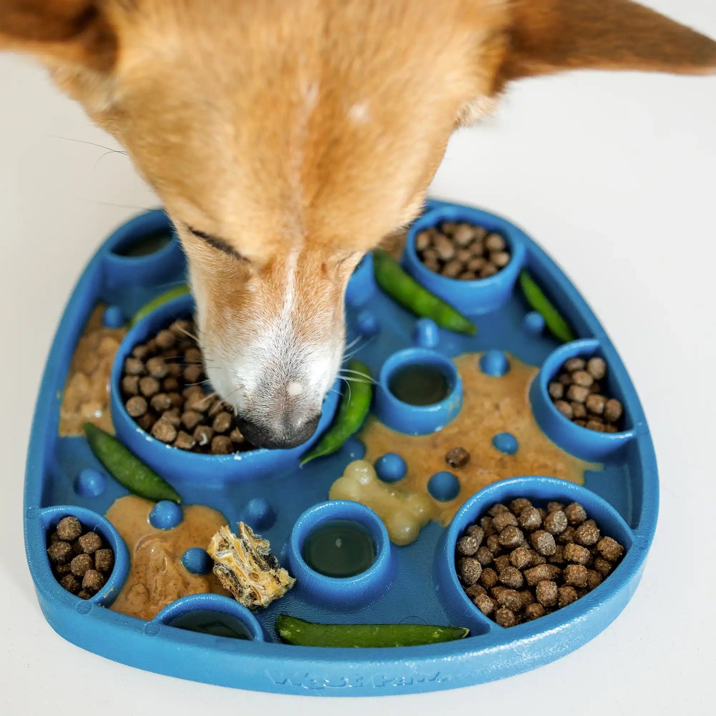 Two-sided dog feeding mat that works as both a slow feeder and a lick mat