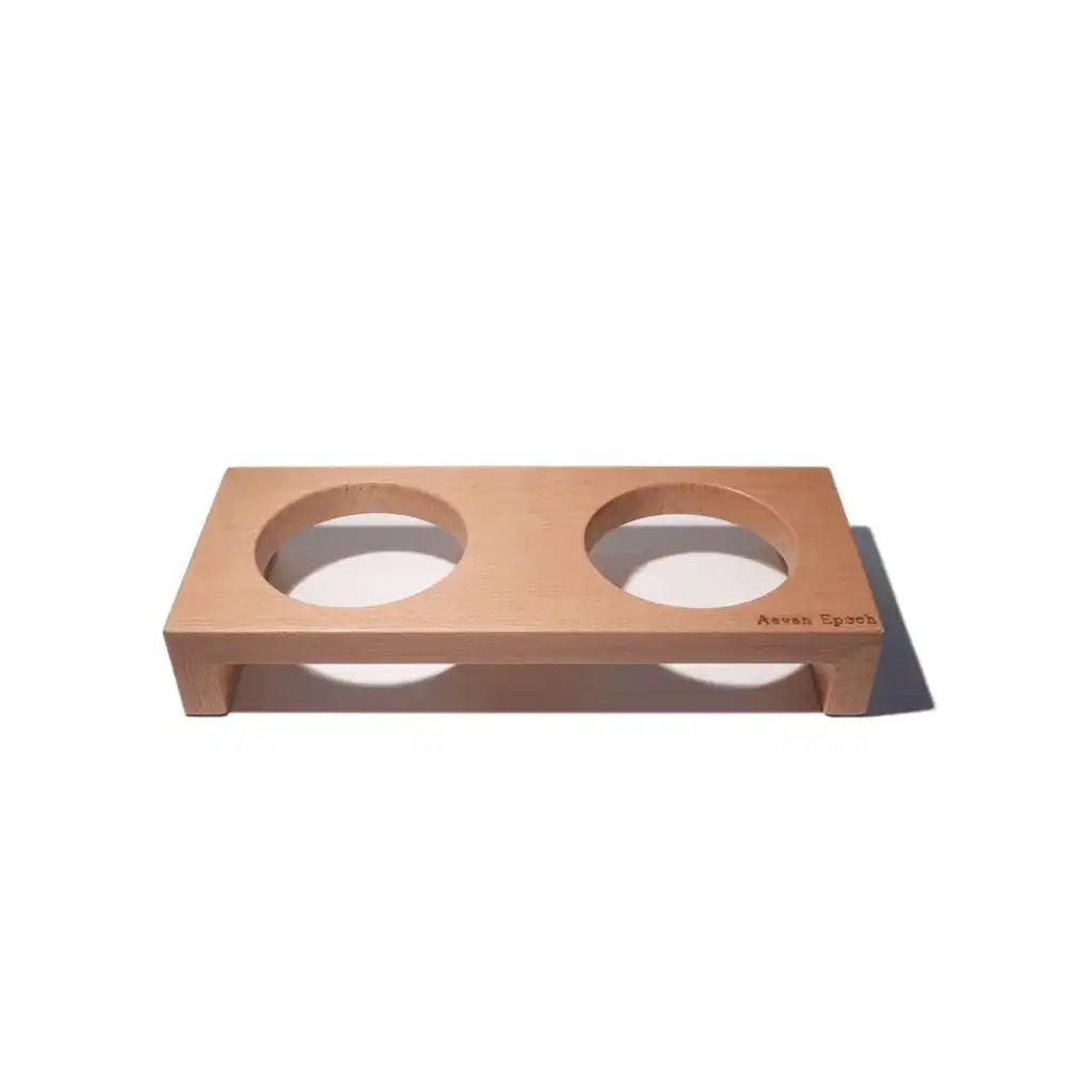 Wooden double-dish pet feeder on a white background
