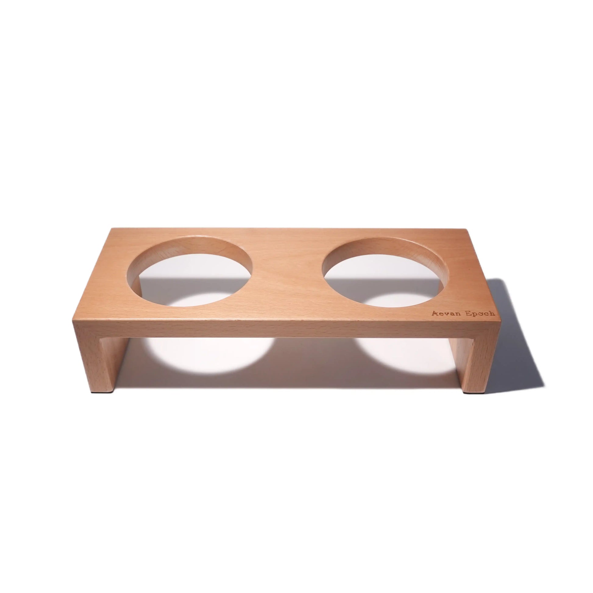 Wooden double-dish pet feeder on a white background