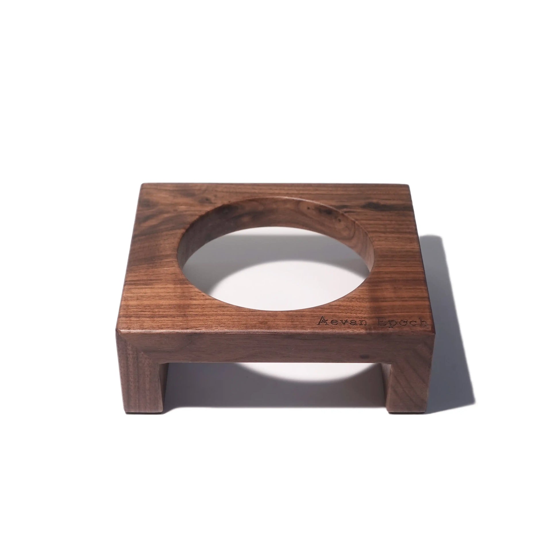 Wooden pet bowl stand on a white background