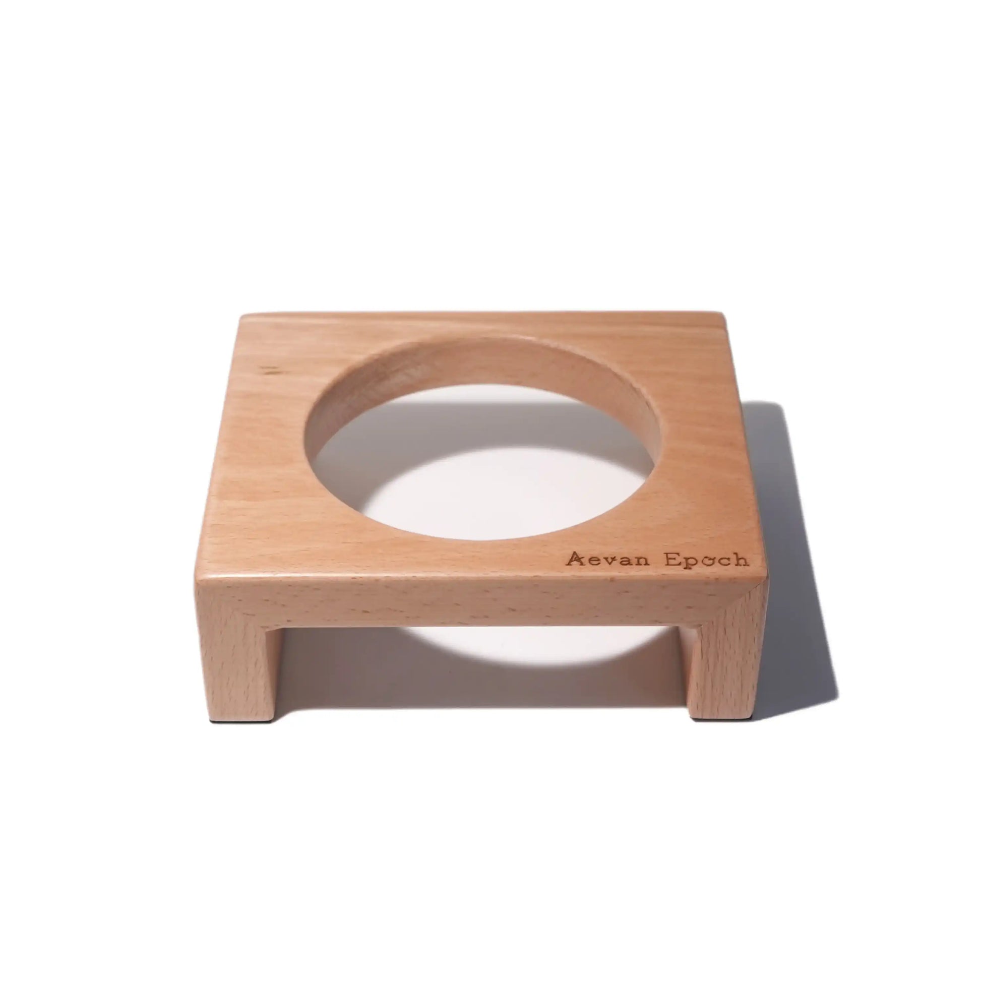 Wooden with circular depression and 'Aevan Epoch' branding on a white background