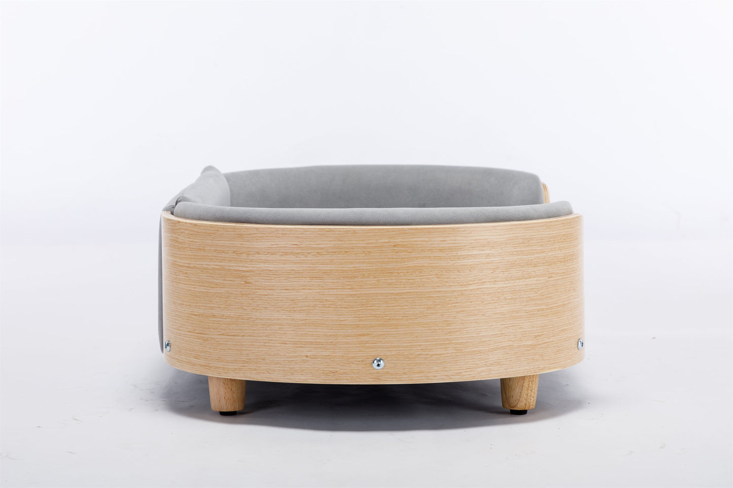 Scandinavian-style dog bed with a minimal wooden frame