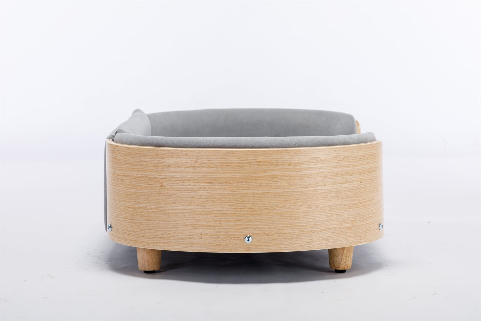 Scandinavian-style dog bed with a minimal wooden frame