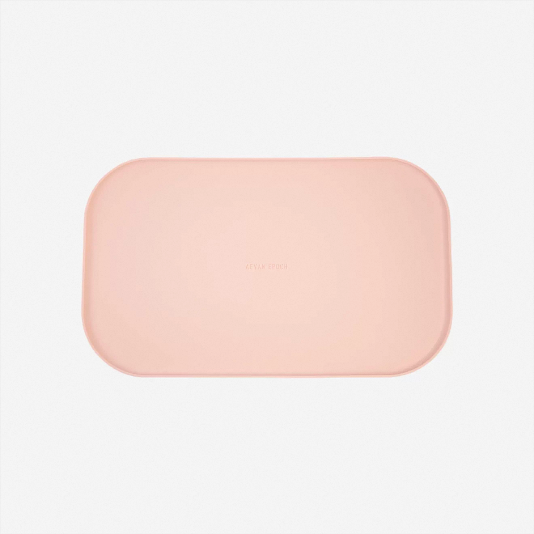 aevan-epoch-peach-silicone pet feeding mat for organizing pet food and water bowls