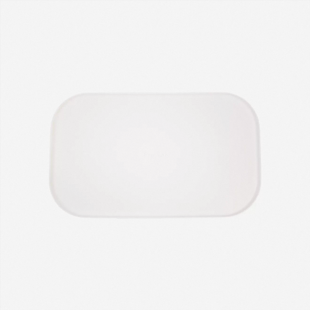 White silicone pet feeding mat with raised edges for a clean home feeding corner
