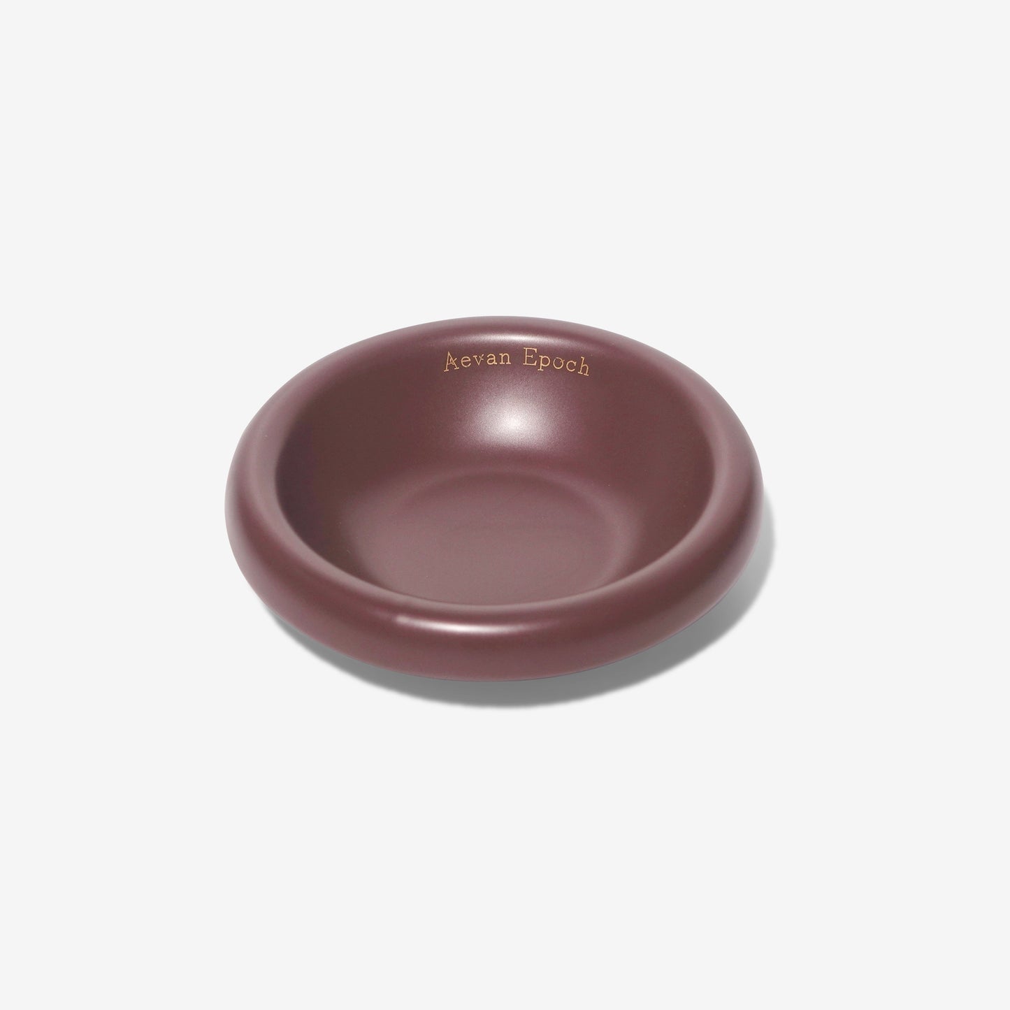 Round pink bowl with 'Aevan Epoch' branding on a white background