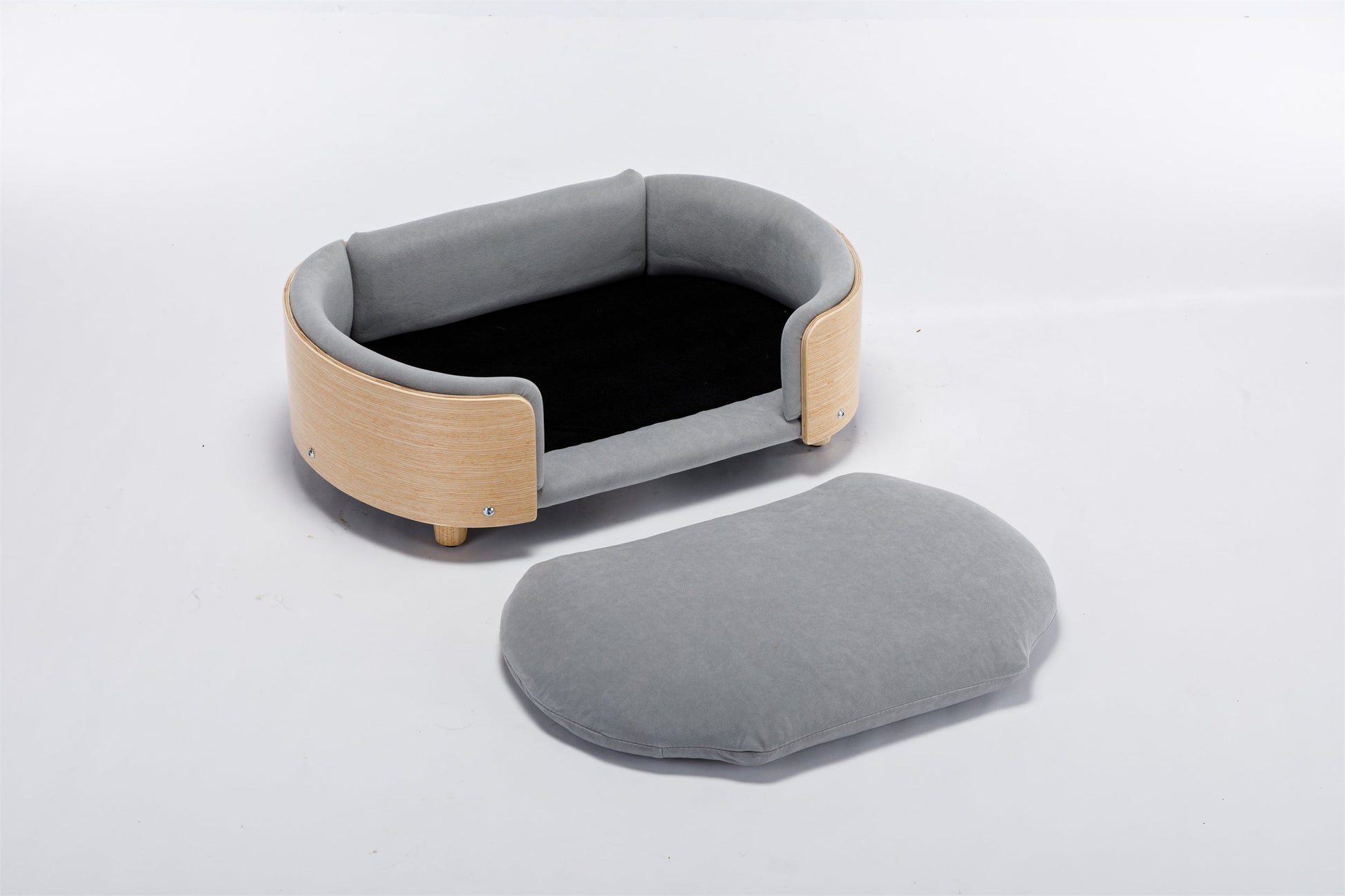 Elevated dog bed that fits naturally into a shared living space