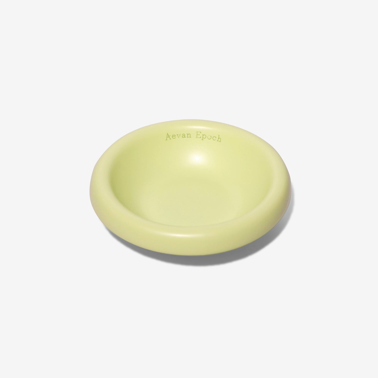 Light green pet bowl on a white background
